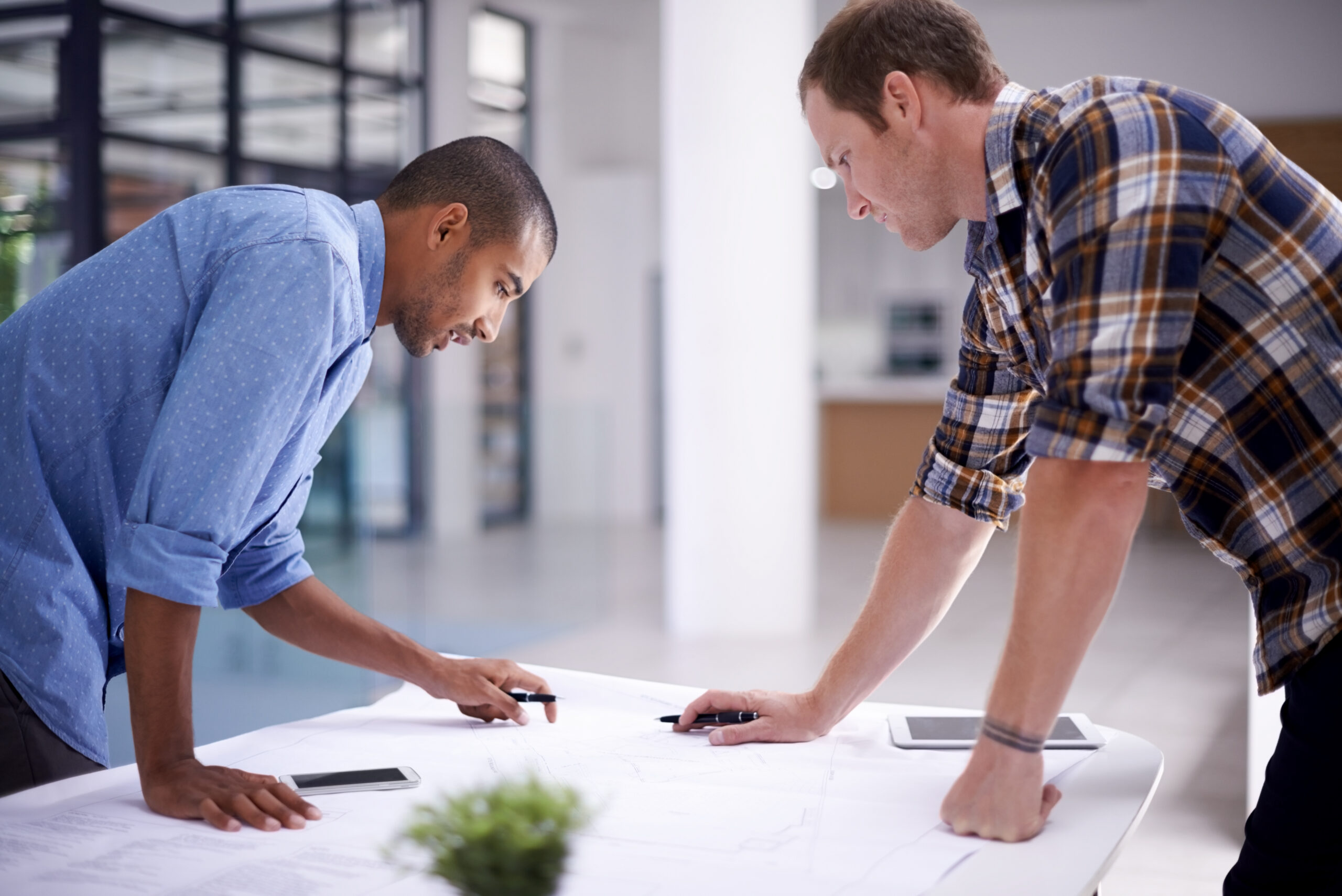 Man, blueprint and office teamwork planning, discussion and architect pr tablet or property design. Development, engineering and vision with coworkers, brainstorming and staff for renovation talk.